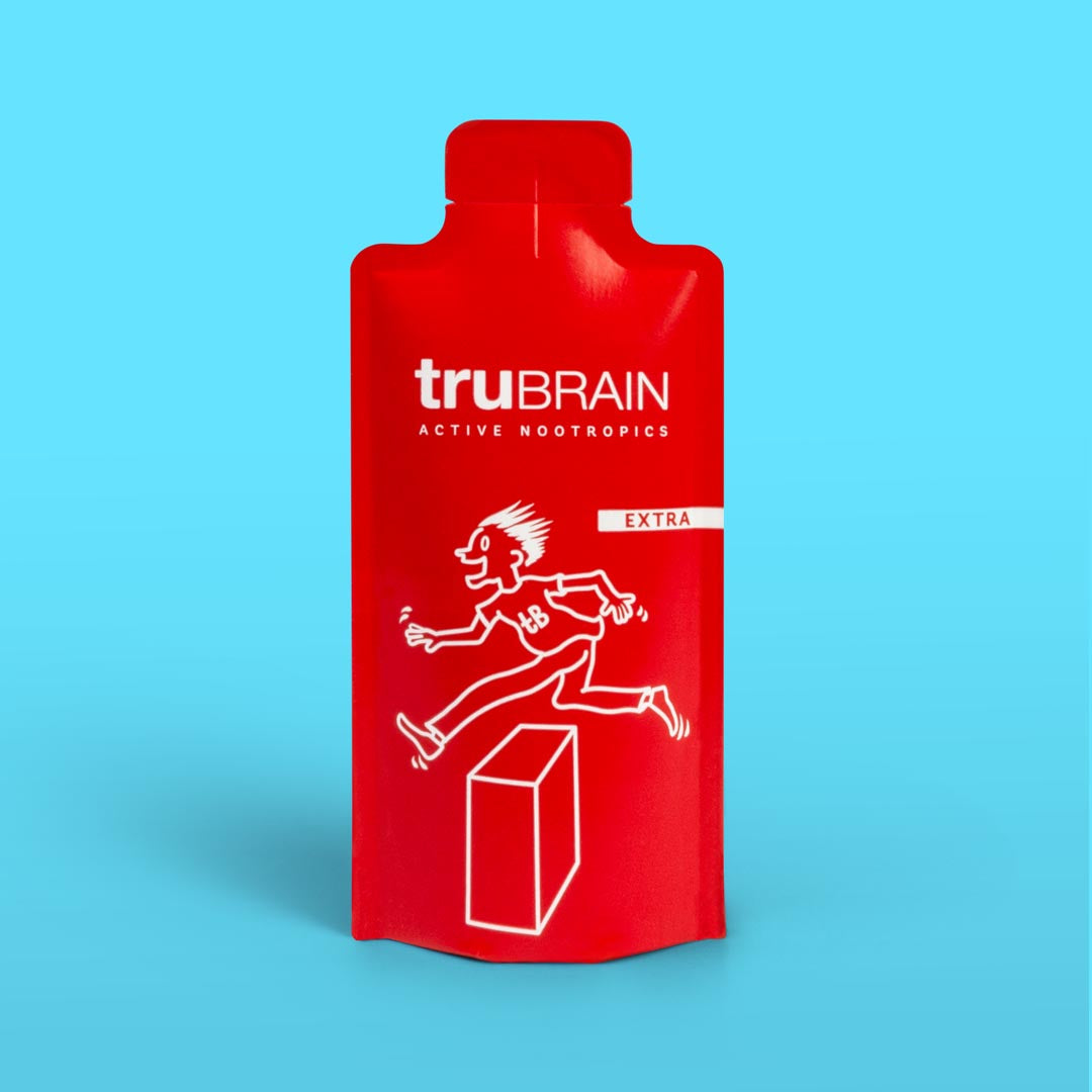 Closeup hero shot on blue background of the front of TruBrain’s Extra Strength drink which has Nootropics for radical, immediate focus.